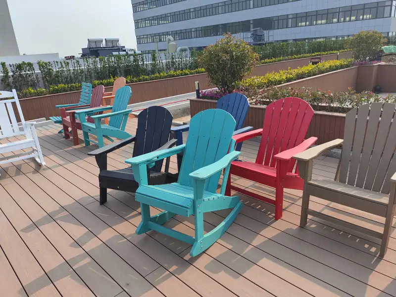 Custom color HDPE Adirondack chairs lineup produced by Supereco, a leading custom Adirondack chairs manufacturer