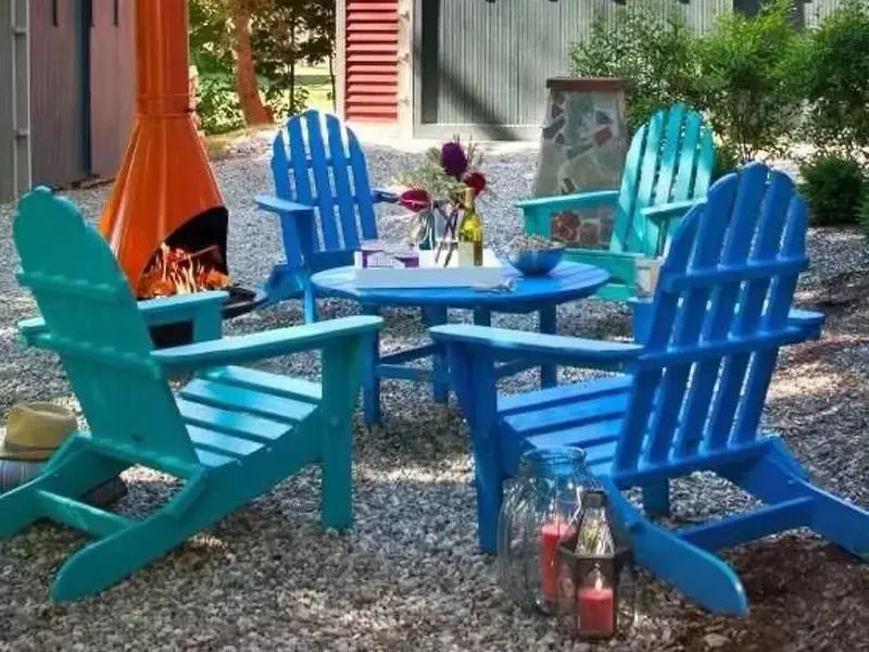 Factory direct HDPE Adirondack patio chairs arranged around fire pit table for outdoor restaurant dining