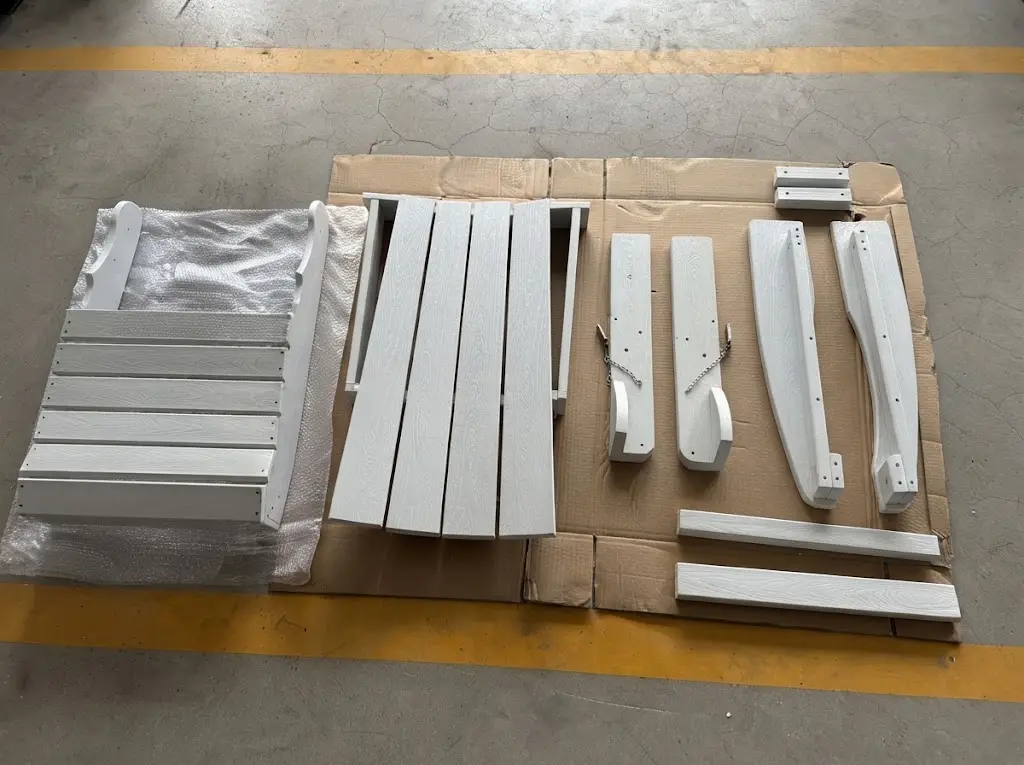 Individual carton packaging with disassembled HDPE Adirondack chair parts and 304 hardware for bulk export