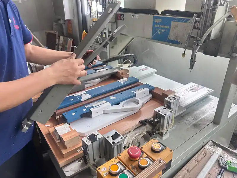Factory automated machinery assembling custom HDPE folding Adirondack chair parts during production